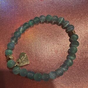 Gold and Blue Beaded Bracelet with Natural Charm